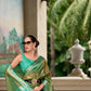 EKKTARA Saree For Women Olive Green Colour Pure Tissue Saree With Designer Pallu And Unstitched Blouse