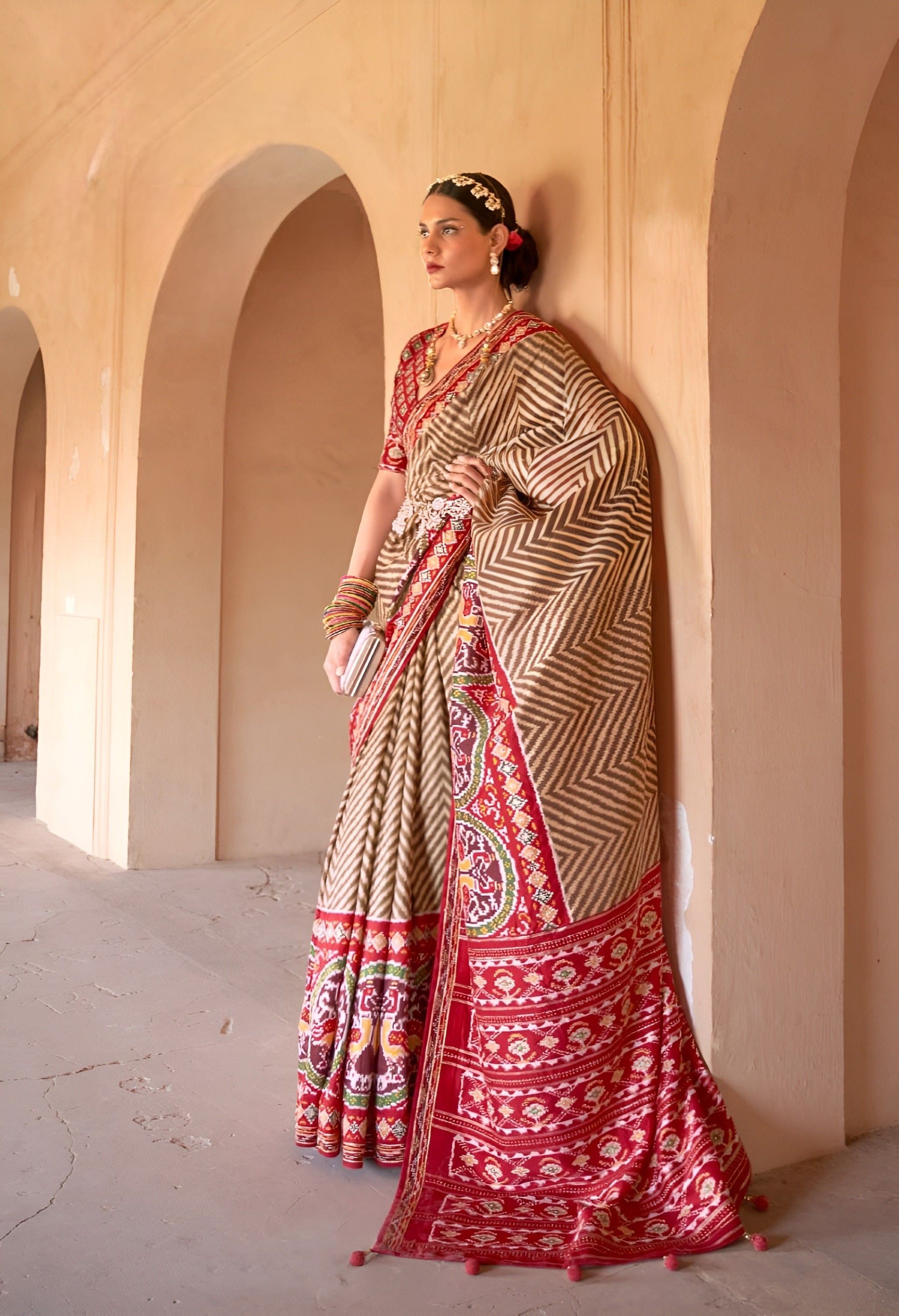 Red Woven Art Silk Patola Saree With Tassels