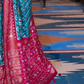 EKKTARA Saree For Women Turquoise Colour Soft Silk Printed Patola Saree With Unstitched Blouse